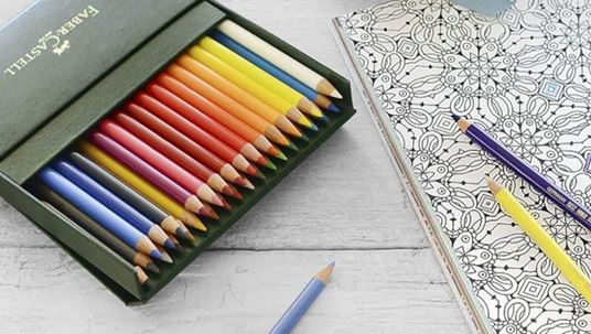 Faber-Castell colored pencils next to a coloring template